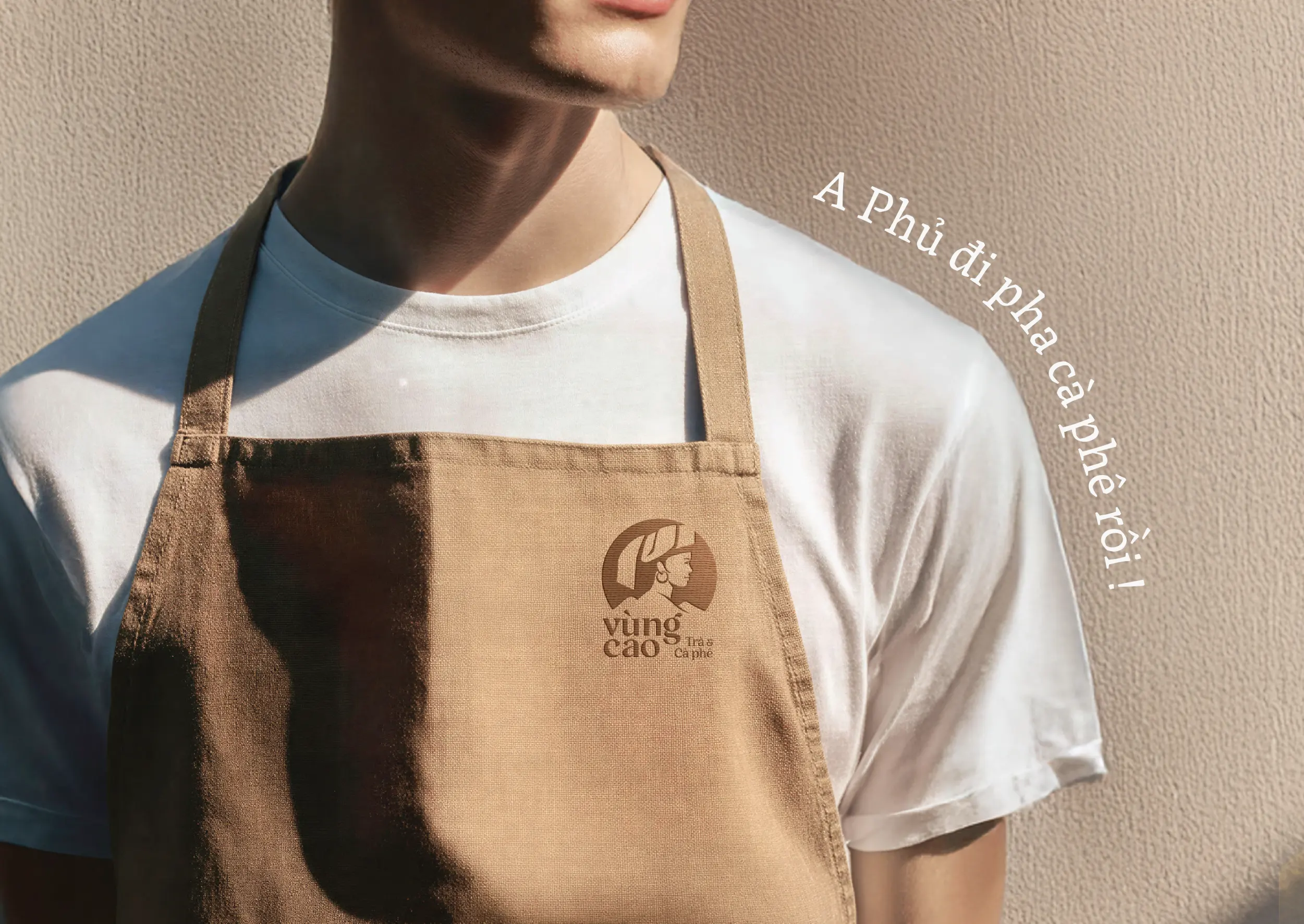 Thiết kế logo và nhận diện thương hiệu Vùng Cao Trà & Cà Phê do Guru Design thực hiện, thiết kế tạp dề